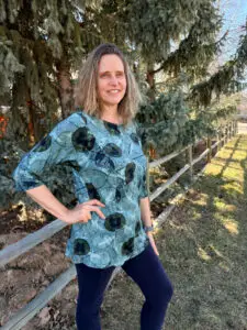 Giorgio's Top sewing workshop Longmont - a princess-seamed knit top with 3/4 sleeves and peplum hem in a blue-green leaf print fabric