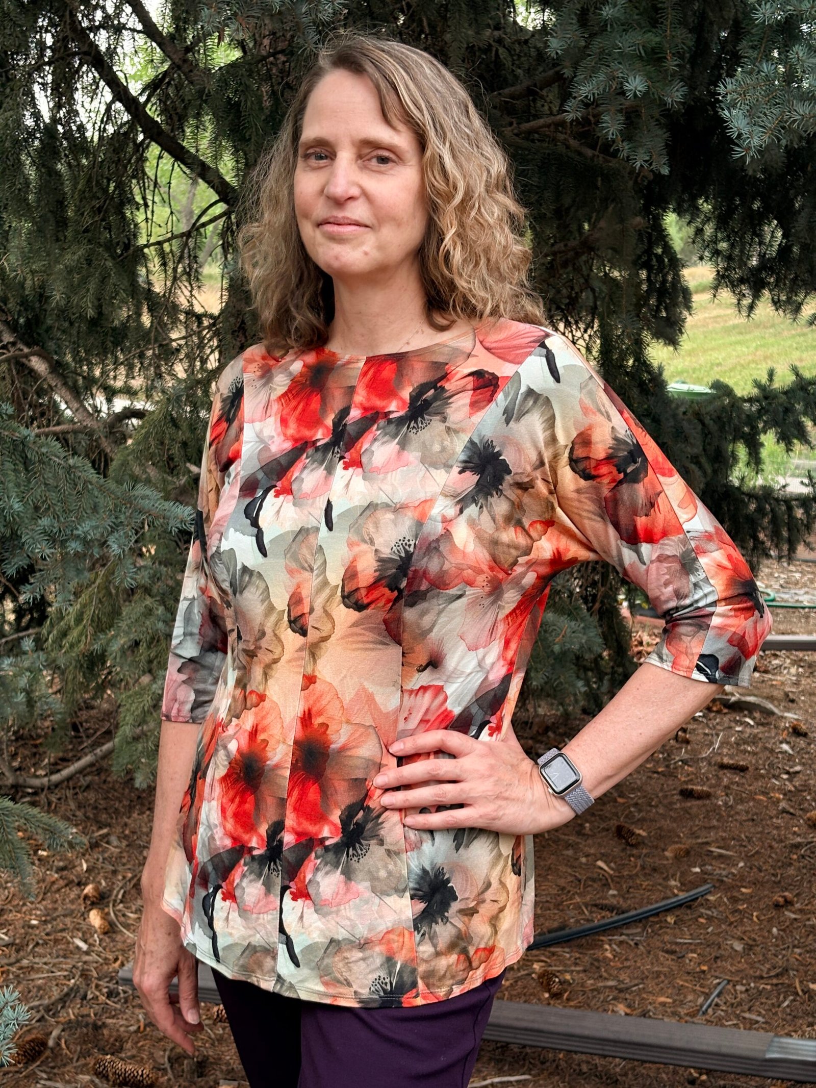 Giorgio's Top by Silhouette Patterns - a princess-seamed knit top with 3/4 sleeves and peplum hem in a red, black print fabric